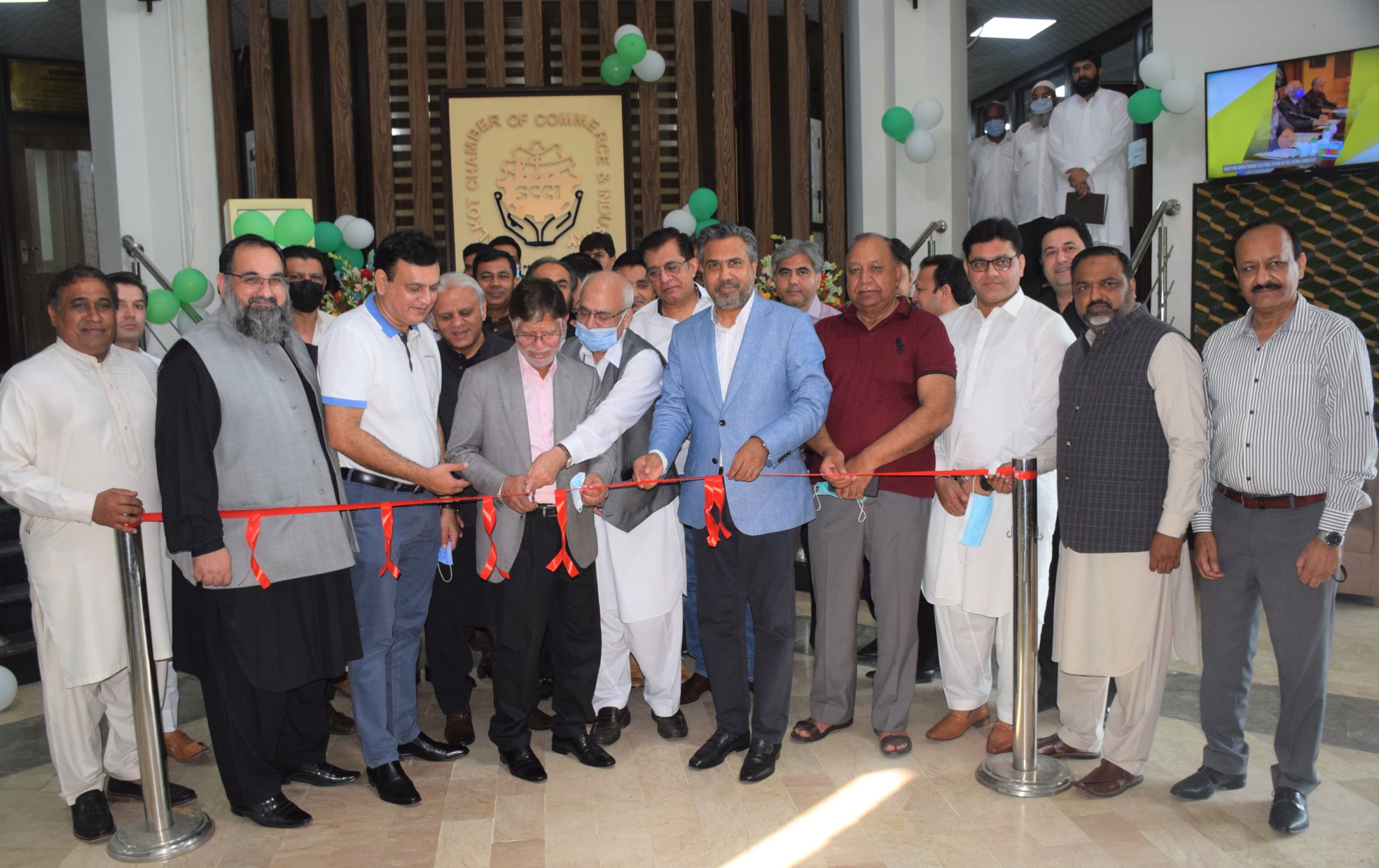 On August 30, 2021, an inauguration ceremony of “Establishment of Membership Department, Conference room for online meetings and Dining Hall” was held at Sialkot Chamber of Commerce & Industry. The Program commenced with the ribbon cutting by Mr. Sheikh Riaz ud Din, Mr. Qaisar Iqbal Baryar, President, Mr. Khuram Aslam, Senior Vice President, Mr. Ansar Aziz Puri, Vice President, Former Presidents and Members of Executive Committee, SCCI.   President, SCCI thanked all the guests for gracing the occasion by their presence and said that the news departments would help in providing best services to the members.