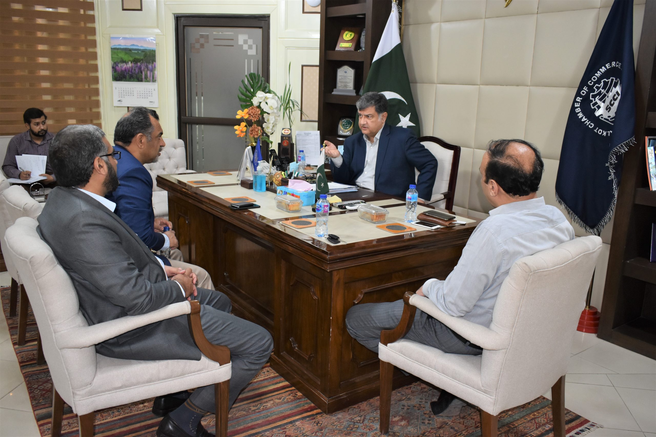 Mian Imran Akbar, President Sialkot Chamber of Commerce & Industry in a meeting with Manager of Bank Alfalah to discuss issues of Sialkot Industry on June 14, 2022.