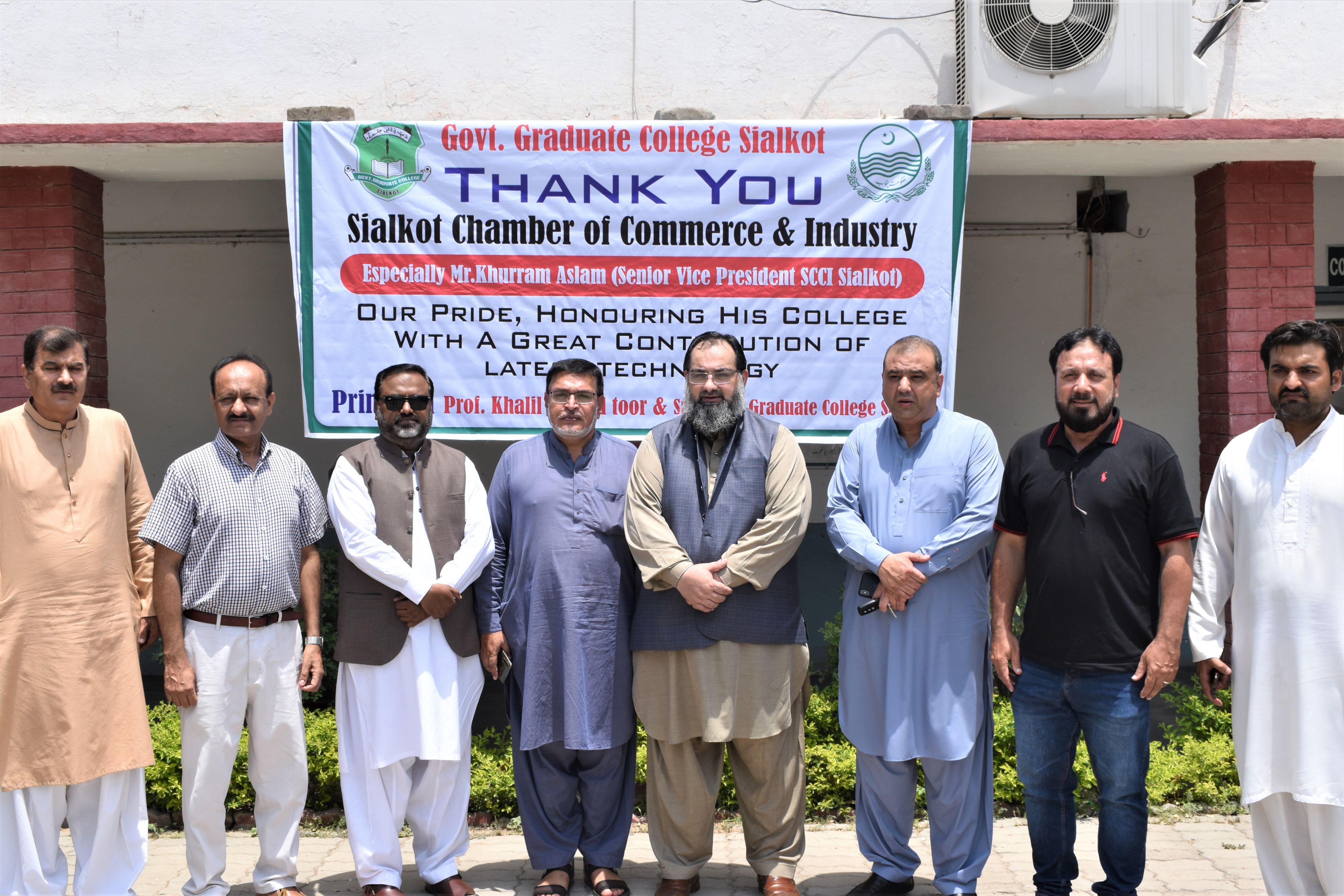 On July 06, 2021, Mr. Khuram Aslam, Senior Vice President, Sialkot Chamber of Commerce and Industry inaugurated IT Lab at the Government Graduate College Sialkot (Qila). During the IT LAB Opening ceremony, Professor Khalil Toor, Principal, Govt. College Qila Sialkot thanked SCCI for its contributions in establishment of IT lab for the students of the said College. Mr. Bilal Dar and Sheikh Zahid Hameed, Executive Committee Members SCCI and Mr. Ejaz Ghauree were also present during the ceremony. On July 06, 2021, Mr. Khuram Aslam, Senior Vice President, Sialkot Chamber of Commerce and Industry inaugurated IT Lab at the Government Graduate College Sialkot (Qila). During the IT LAB Opening ceremony, Professor Khalil Toor, Principal, Govt. College Qila Sialkot thanked SCCI for its contributions in establishment of IT lab for the students of the said College. Mr. Bilal Dar and Sheikh Zahid Hameed, Executive Committee Members SCCI and Mr. Ejaz Ghauree were also present during the ceremony.