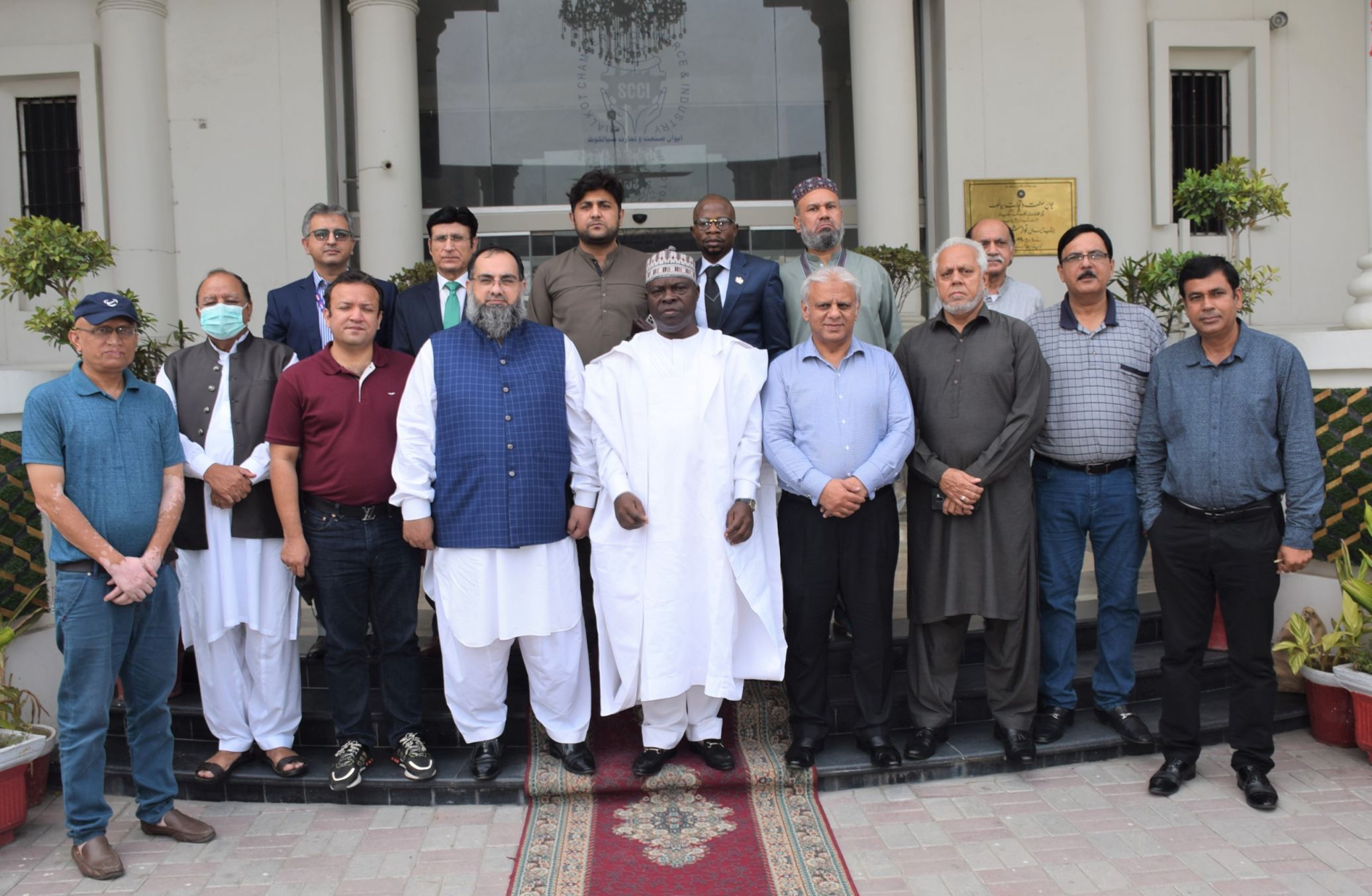 On August 09, 2021, H.E. Mohammad Bello Abioye, High Commissioner of Republic of Nigeria to Pakistan visited The Sialkot Chamber of Commerce and Industry to interact with the business community of Sialkot in order to discuss the issues of mutual interest that would facilitate in expansion of bilateral trade between the both countries.   Mr. Khuram Aslam, Senior Vice President and Mr. Ansar Aziz Puri, Vice President, SCCI warmly welcomed the High Commissioner and exchanged their views with H.E. for enhancing the mutual trade relations by exchanging trade delegations, participating in trade fairs and organizing business conference between both countries with the aim to increase business activities.   H.E. Mohammad Bello Abioye expressed his gratitude for the warm welcome and cooperation by SCCI. H. E. welcomed the business community of Sialkot to build liaison with Nigeria in planning Trade exhibitions and joint ventures for increasing trade relations.