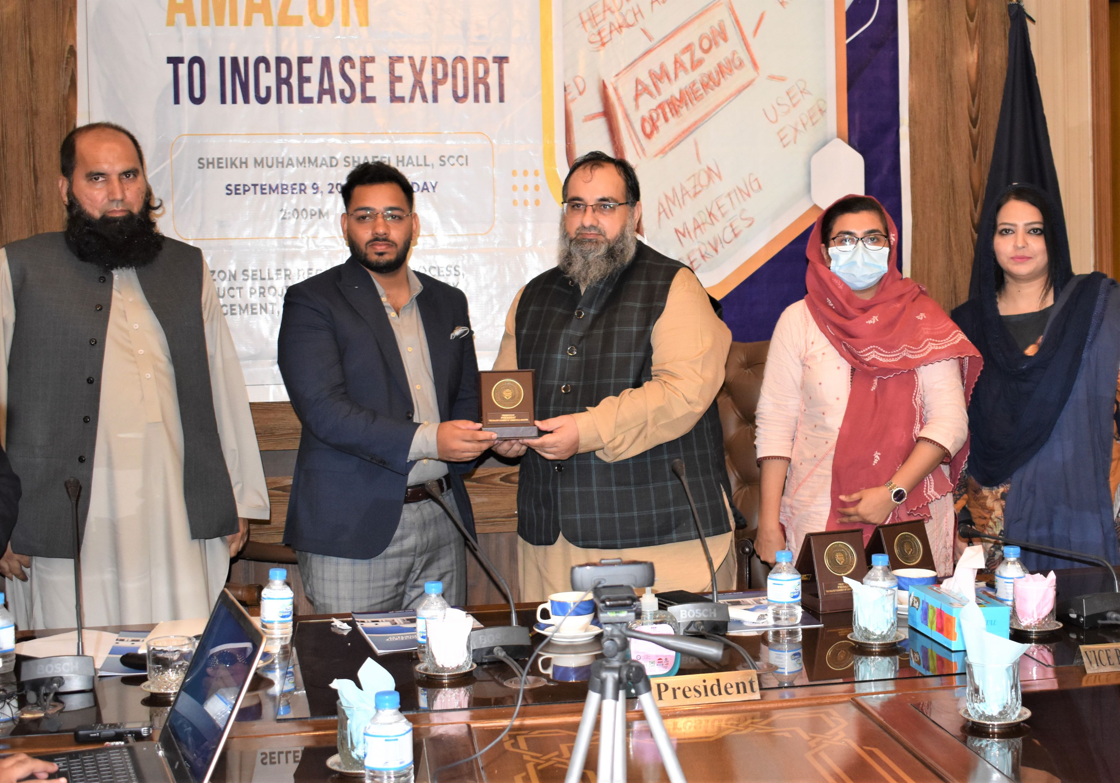 On September 09, 2021, Sialkot Chamber of Commerce & Industry in collaboration with Trade Development Authority of Pakistan organized an intensive “Seminar on Amazon” to educate business community of Sialkot about account registration, product listing, payment methods (as per SBP regulations) and related logistics support. Mr. Khuram Aslam, Senior Vice President, SCCI appreciated the efforts of Mr. Jamil Ahmed, Director Services TDAP and his team for arranging such fruitful session for members of Sialkot Chamber. Mr. Adil Mukhtar, Assistant Director, E-Commerce, TDAP, Ms. Urva Hassan Zubairi, Assistant Manager, Banking & Insurance, Services Division TDAP, Mr. Mohammad Amir Khan, Assistant Manager, Transport & Logistics, Services Division TDAP presented the audience regarding the Step-by-Step practical guide to account registration, listing, payment and logistics processes on Amazon. Problems faced while utilizing the Seller Center of Amazon were also discussed and relevant solutions were advised through Q/A session. The Seminar was also broadcasted on Zoom apart from being arranged at the Sialkot Chamber. On September 09, 2021, Sialkot Chamber of Commerce & Industry in collaboration with Trade Development Authority of Pakistan organized an intensive “Seminar on Amazon” to educate business community of Sialkot about account registration, product listing, payment methods (as per SBP regulations) and related logistics support. Mr. Khuram Aslam, Senior Vice President, SCCI appreciated the efforts of Mr. Jamil Ahmed, Director Services TDAP and his team for arranging such fruitful session for members of Sialkot Chamber. Mr. Adil Mukhtar, Assistant Director, E-Commerce, TDAP, Ms. Urva Hassan Zubairi, Assistant Manager, Banking & Insurance, Services Division TDAP, Mr. Mohammad Amir Khan, Assistant Manager, Transport & Logistics, Services Division TDAP presented the audience regarding the Step-by-Step practical guide to account registration, listing, payment and logistics processes on Amazon. Problems faced while utilizing the Seller Center of Amazon were also discussed and relevant solutions were advised through Q/A session. The Seminar was also broadcasted on Zoom apart from being arranged at the Sialkot Chamber.